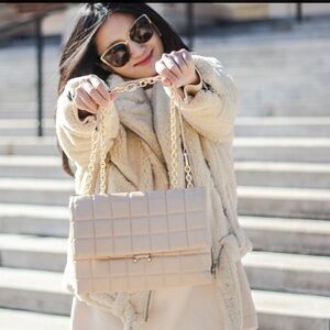 HOUSE OF WANT We Step Up Vegan Leather Shoulder Bag white quilted two way bag